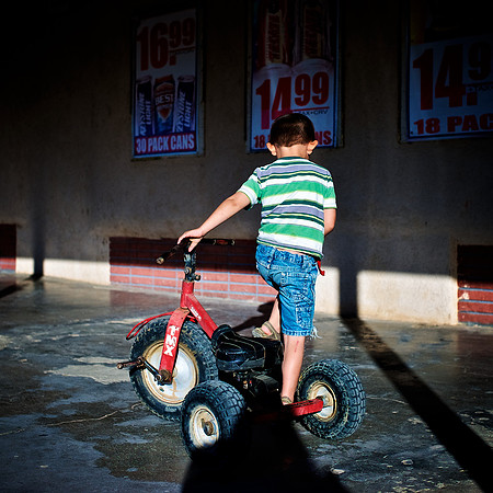 Boy on Trike – Niland, California – 2012